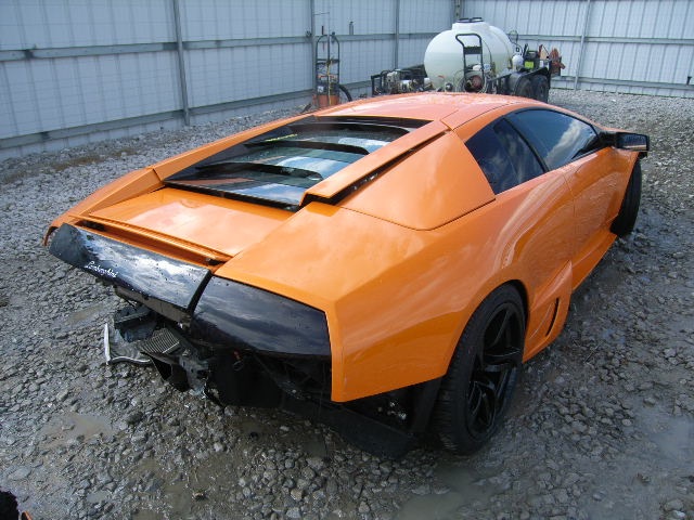 Damaged Orange Lamborghini Murcielago LP640 Coupe